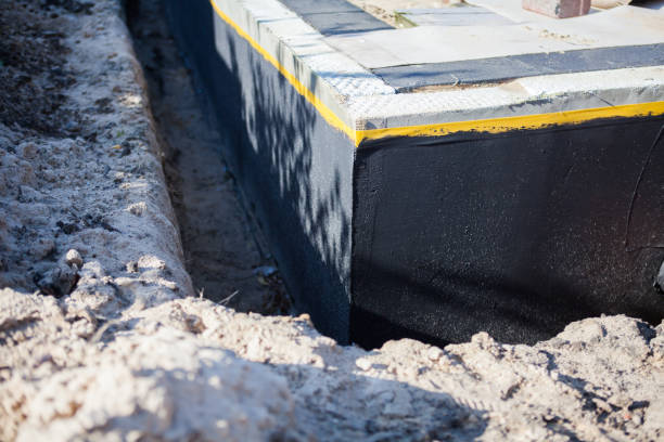 Professional Waterproofing technician working in Plainfield, OH